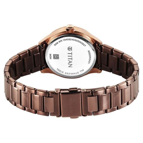 Buy Online Titan Glamour Quartz Analog with Date Brown Dial Brown ...