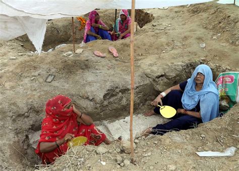 Yeh Hai INDIA! Why Are These Farmers Digging Graves? - Rediff.com India ...