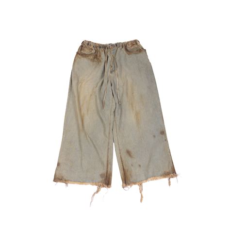 Oversized unisex denim with hand-painted light mud-washed surface (Ind ...