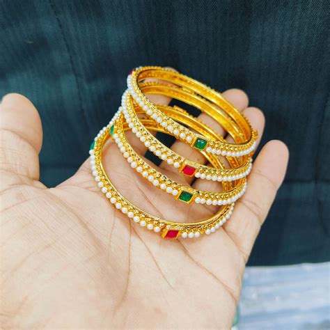 Pooja Bangles Gold Plated Crystal Stone And Pearls Bangles Set ...