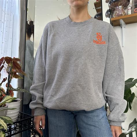 plain syracuse university sweatshirt no stains or... - Depop