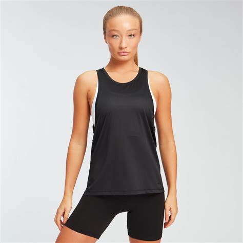 Women's Gym Vests & Tanks | Sports Clothing | MYPROTEIN™