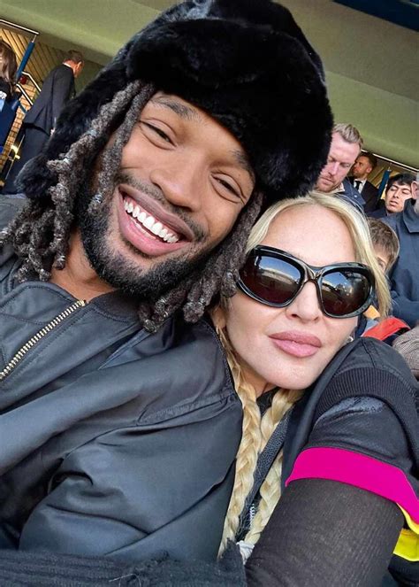 Madonna Cuddles Up to Boyfriend Akeem Morris, Attends London Soccer Game