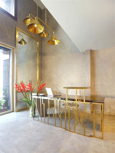 Abu Jani and Sandeep Khosla | New fashion store Asal shimmers in gold ...