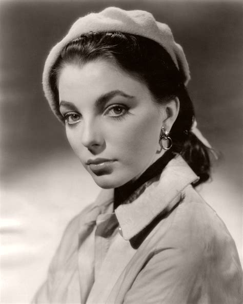 Joan Collins, English actress, wears a beret