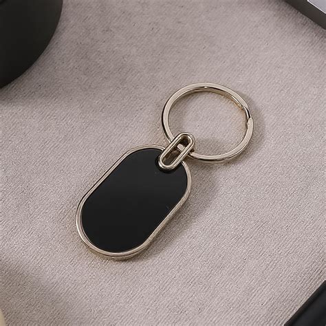 Elegant Black & Silver Oval Metal Keychain (1 Pc)