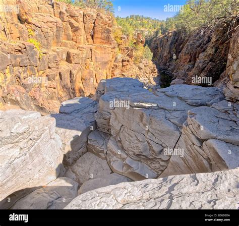 The blocky cliffs of Sycamore Falls in the Kaibab National Forest near ...
