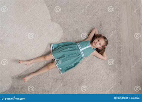Little Girl Lying On Floor at William Farr blog