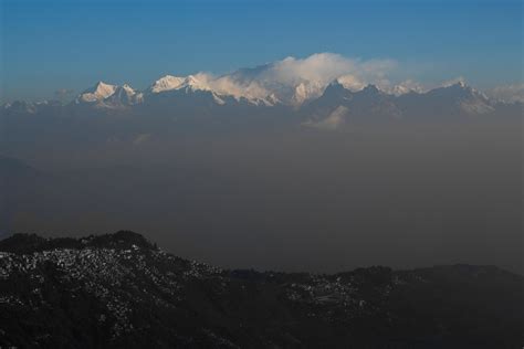 ITAP at sunrise, the peaks of Kanchenjunga and village nearby : r ...