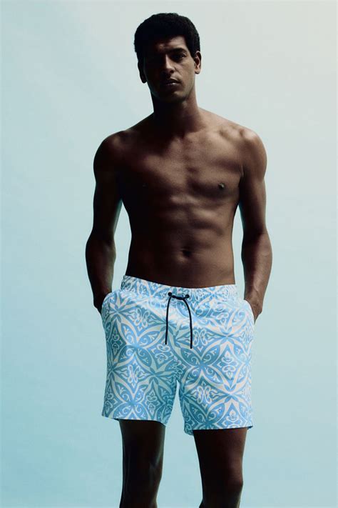 Patterned swim shorts - Light blue/Patterned - Men | H&M IN