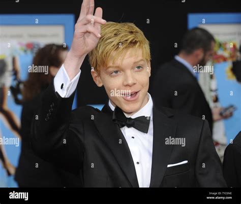 Cast member Cameron Monaghan attends the premiere of the film "Prom" at ...