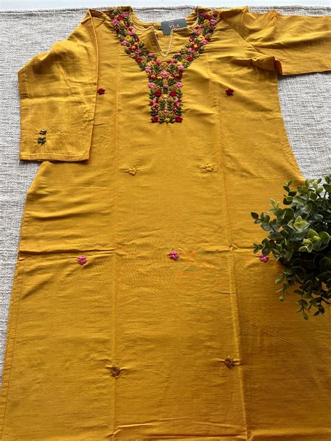 Yellow Hand embroidery silk cotton kurti – VIKA Boutique