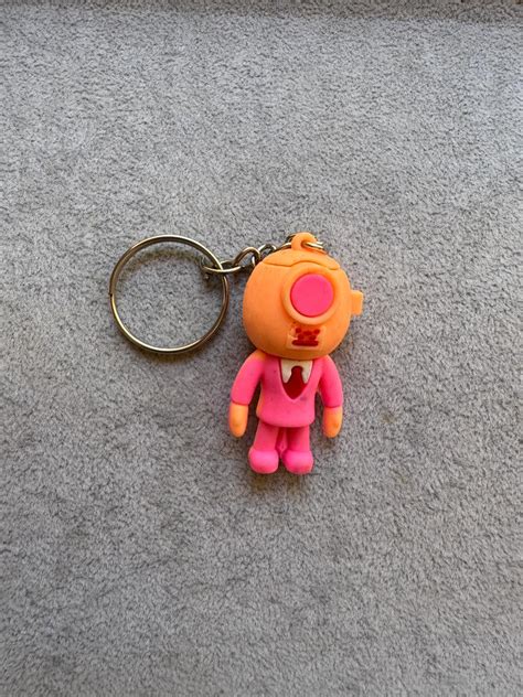 Pink Character Keychain with Helmet | Quirky Charm – MIRAGE GLIM