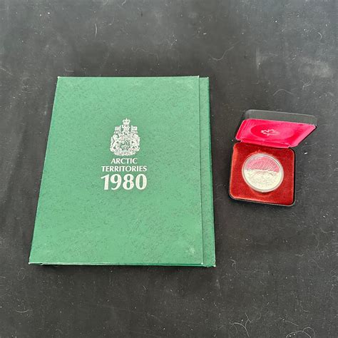 Lot - Canada, 1980 Silver Dollar in RC MInt case, with a special ...