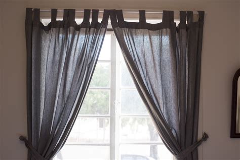 Free Image of Window with dark colored drapes | Freebie.Photography