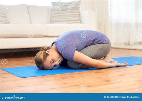Woman Doing Yoga Childs Pose at Home Stock Photo - Image of retreat ...