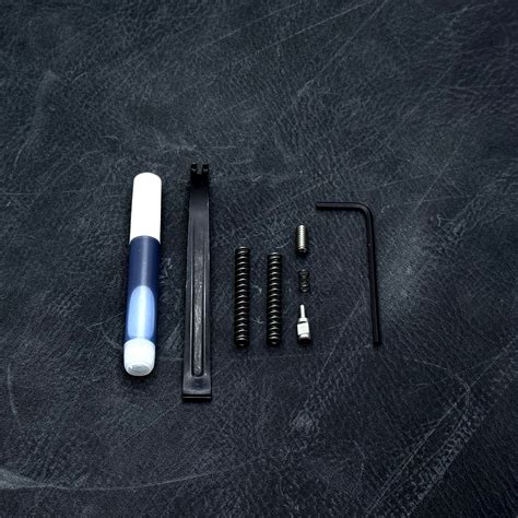 Image result for Revolver Spring Compressor