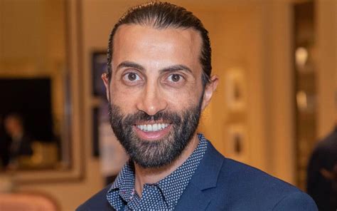 https://static.timesofisrael.com/www/uploads/2018/12/profile-suit-e1713796727451.jpg