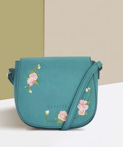Caprese Blue Sling Bag ELSY SLING MEDIUM TEAL Blue - Price in India ...