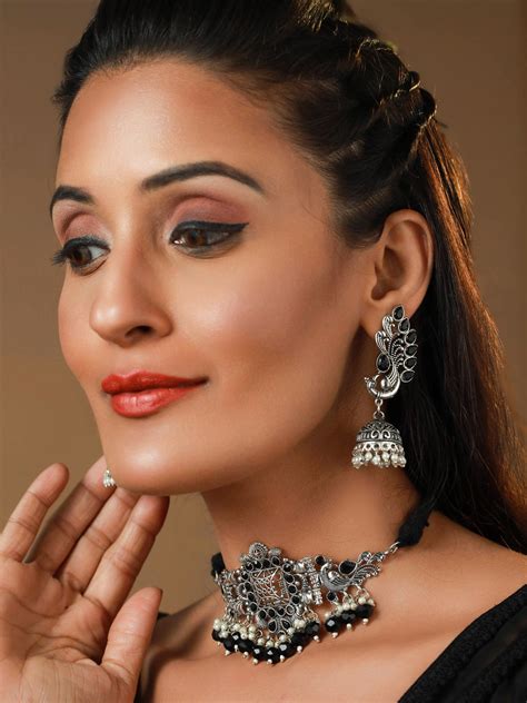 Priyaasi Oxidised Silver Studded Peacock Pearl Jewellery Set