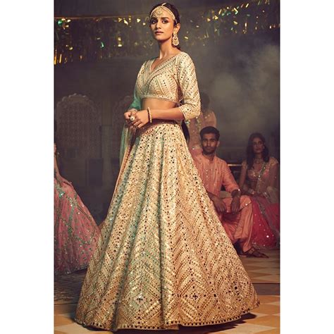 Janhvi Kapoor’s gold mirror work Abu Jani Sandeep Khosla lehenga came ...