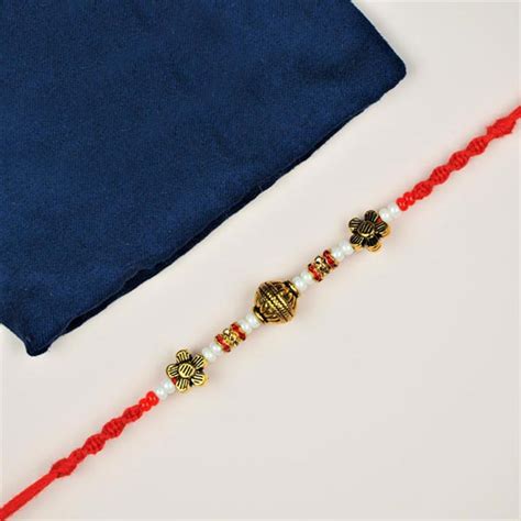 Send Gujarati Style Brass Rakhi Online