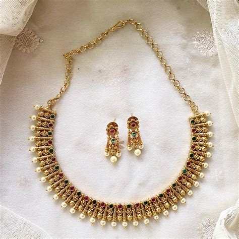Antique matte floral pearl spike short set - Adorna