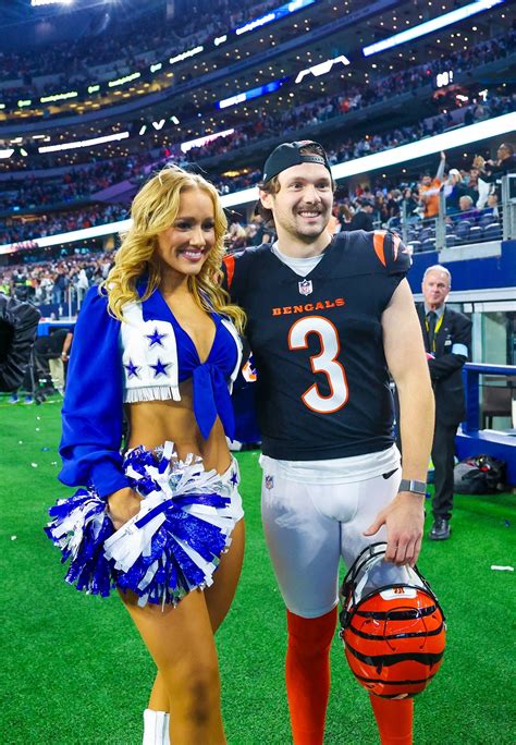 Bengals kicker Cade York kisses Cowboys cheerleader girlfriend Zoe Dale ...