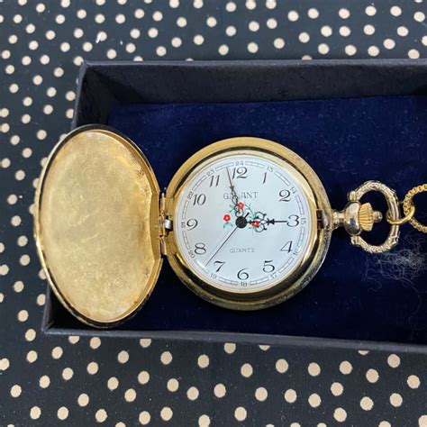 Fob Watch on a Gold Coloured Chain(s)