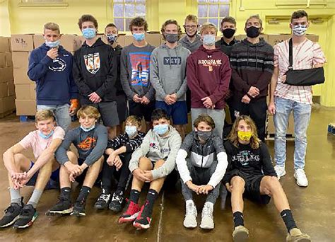 JS boys soccer team helps St. John’s food packing | News, Sports, Jobs - The Express