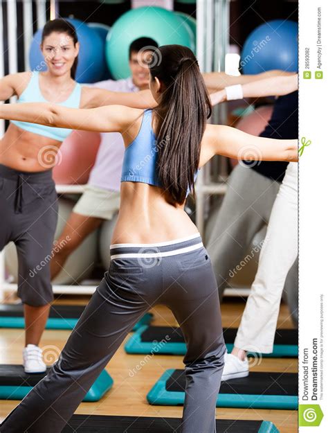 Coach Exercises With Her Group Stock Photo - Image: 28593082