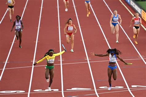 Athletes on the 4 X 100 Meters Relay Race Editorial Stock Image - Image ...