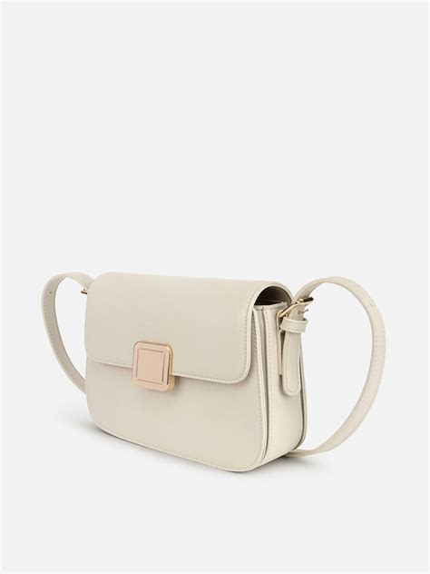 Jennifer Off-White Sling Bag by IRTH | House Of Titan