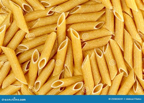 Whole Grain Penne Pasta from Durum Wheat. Top View. Texture Stock Image ...