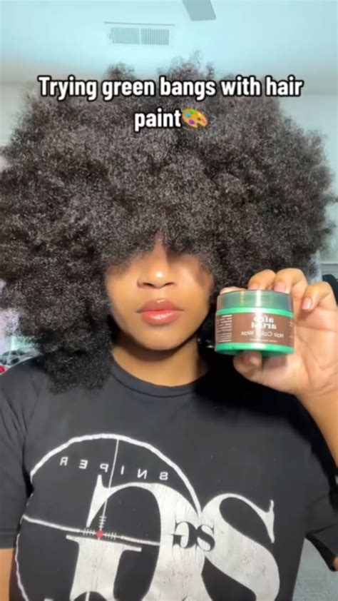 Trying green bangs with temporary hair paint
