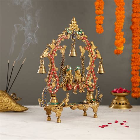 Buy Brass Radha Krishna Swing with Three Diyas 13.5 inch with stonework ...