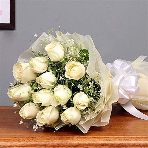 Floweraura fresh flowers Bouquet of 12 White rose flowers in white ...