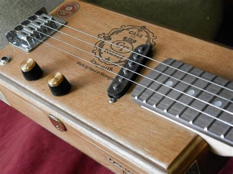 4 String Cigar Box Guitar Lessons 的图像结果