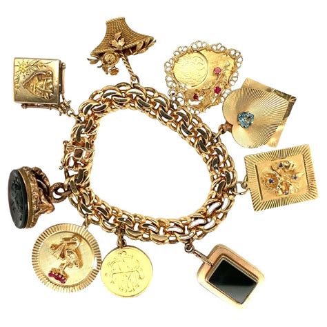 Retro 14 Karat Yellow Gold Charm Bracelet with Moving Charms at 1stDibs ...