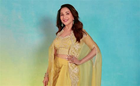 Madhuri Dixit Nene’s cape + drape skirt set proves why yellow is a ...