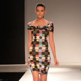 Blackpink's Lisa channels grunge girl in black shorts and knee-high ...