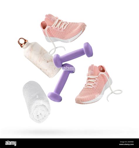 Flying sports shoes with dumbbells, towel and bottle of water on white background Stock Photo ...
