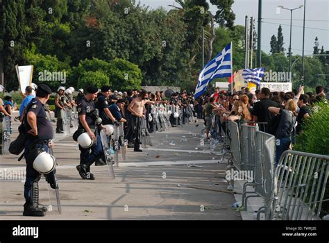Protests against the austerity measures outside the Greek parliament in ...