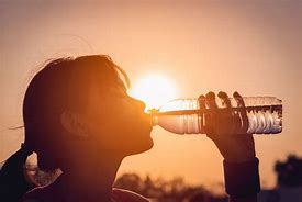 Image result for Man Drinking Water in Pond