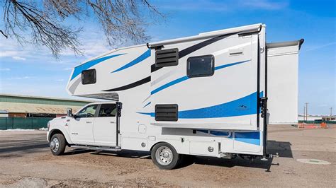 Massive Truck Camper Has Three Slide-Out Sections And A Fireplace