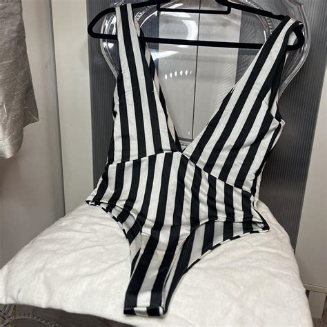PrettyLittleThing Women's Black and White Swimsuit-one-piece | Depop