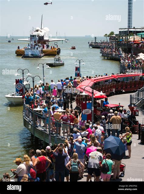 A full-size replica of the space shuttle passes the Kemah Boardwalk on ...