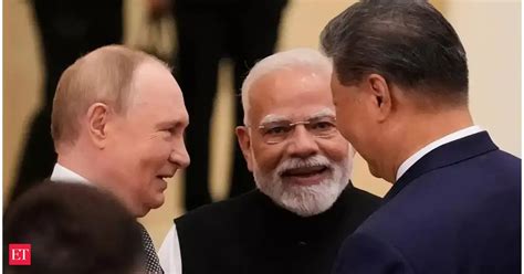 US report takes note of Russia, India, China huddle at SCO Tianjin meet ...