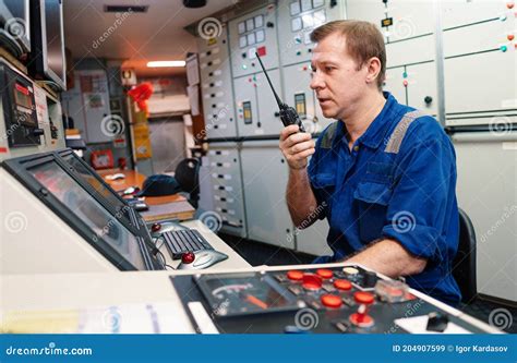 Marine Engineer Officer Controlling Vessel Engines and Propulsion in ...