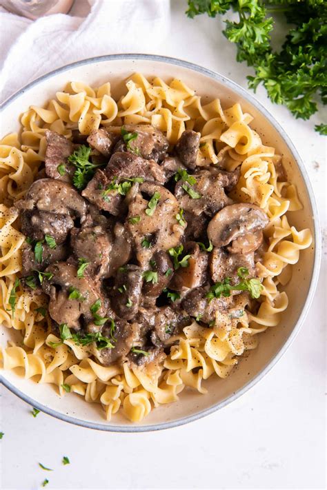 Download Delicious Beef Stroganoff Served On Fusilli Pasta Wallpaper ...
